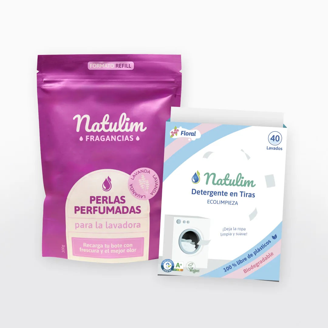 Bolsa morada Lavanda al lado de caja de detergente Floral con franjas rosas y azules