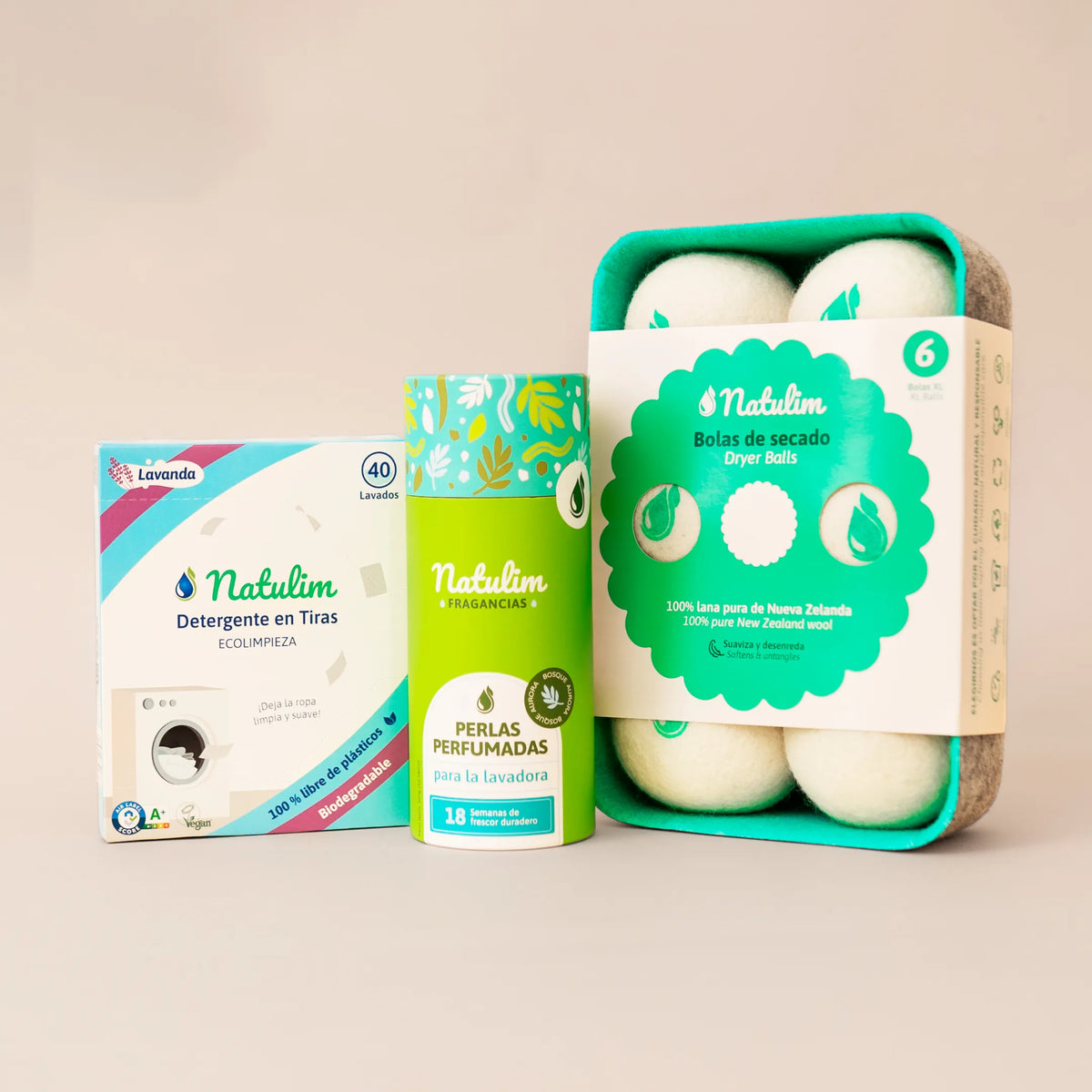 Caja de tiras Lavanda de rayas turquesa y magenta con perlas Bosque Aurora en tubo verde y bolas de secado de lana