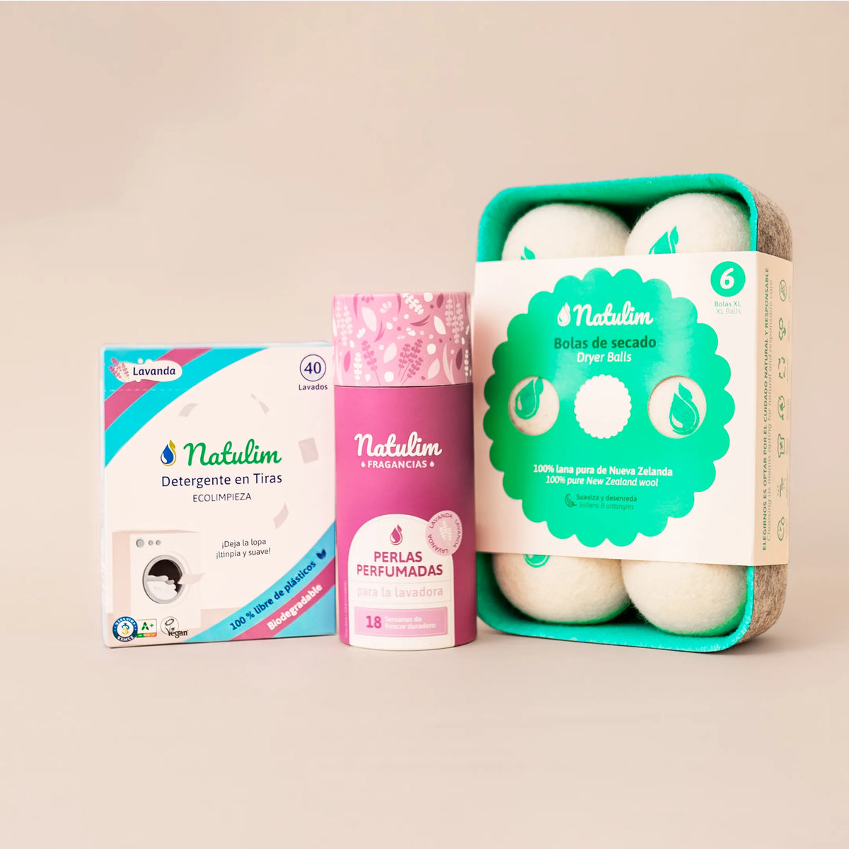 Conjunto Lavanda: caja de tiras de rayas turquesa y magenta, tubo morado de perlas Lavanda y bandeja de 6 bolas de lana