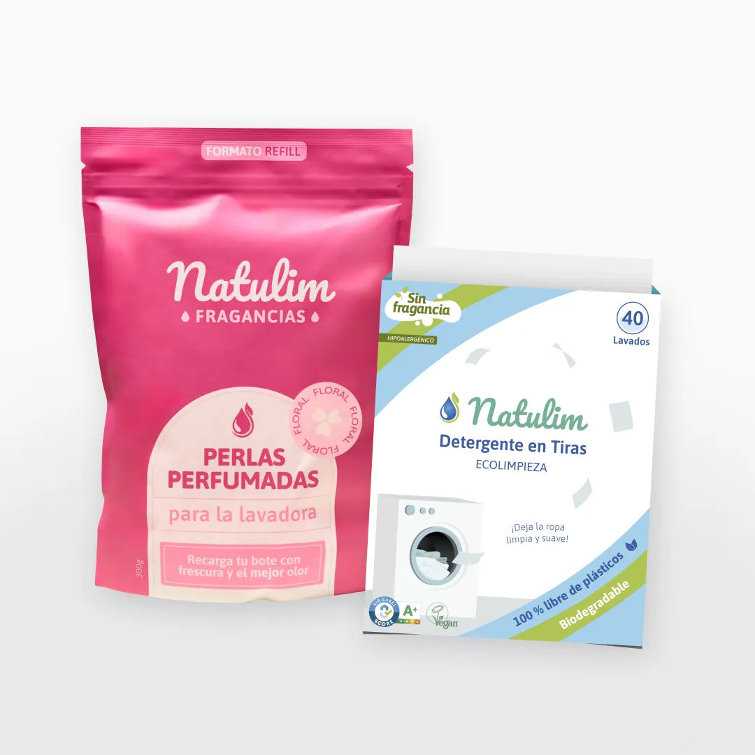 Bolsa rosa Floral junto a caja de detergente Sin fragancia de franjas verdes y azules